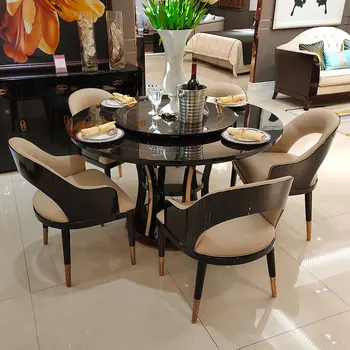 Лека луксозна комбинация от масата за хранене и столове от масив черно дърво, на кръгла маса в стил минимализъм и постмодерното