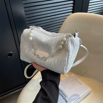 Популярната дамска чанта от това лято 2023, нова нишевая ежедневна чанта през рамо, корейската версия, модни плиссированная чанта през рамо с веригата